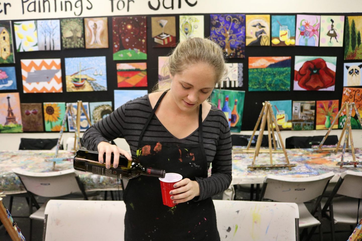 girl pouring wine