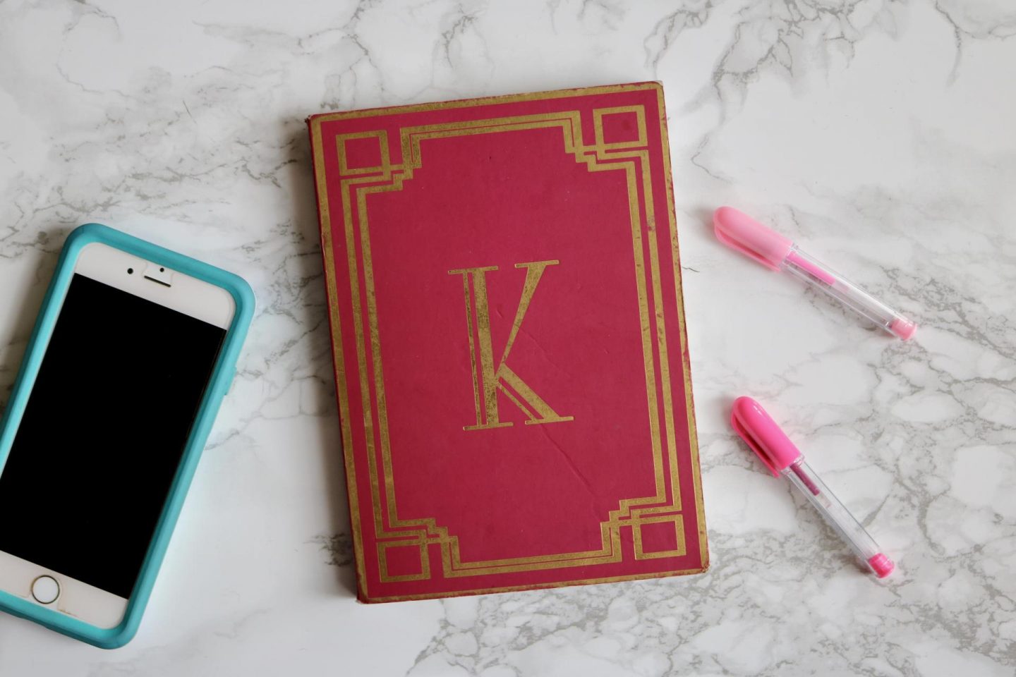 pink and gold notebook