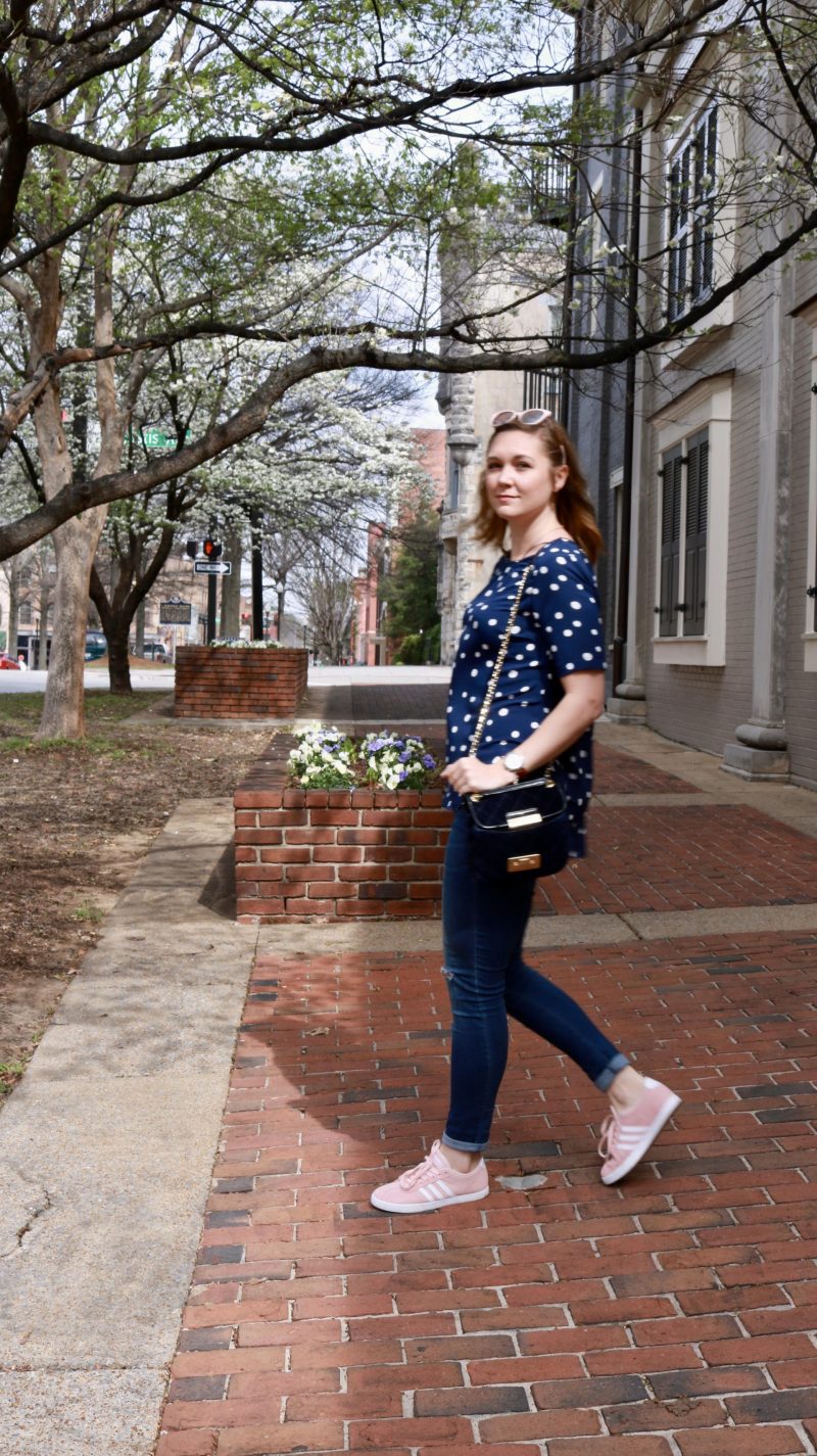 Katie in a navy polka dot shirt